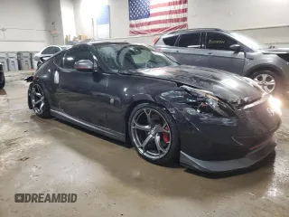 2014 Nissan 370Z Nismo with VIN JN1AZ4EHXEM633754, listed as a Copart auction lot 82035784 with 55,793 mi miles and Salvage Title. Bid and sale history available at DreamBid. Image 4.