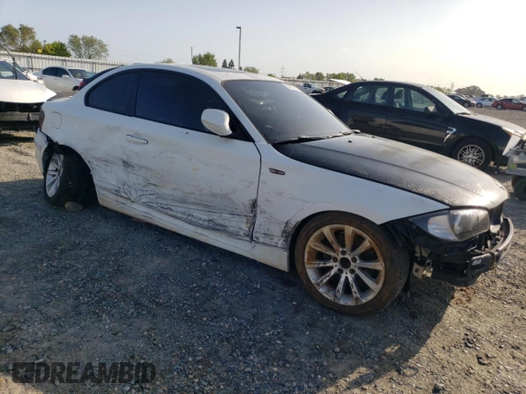 2010 BMW 1 Series 128i with VIN WBAUP9C54AVL89039, listed as a Copart auction lot 50907955 with 135,655 mi miles and Salvage Title. Bid and sale history available at DreamBid. Image 4.