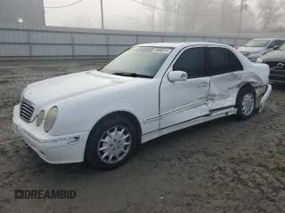 2000 Mercedes-Benz E-Class with VIN WDBJF65J5YB167508, listed as a Copart auction lot 85060814 with 211,469 mi miles and Salvage Title. Bid and sale history available at carsss.com. Image 1.