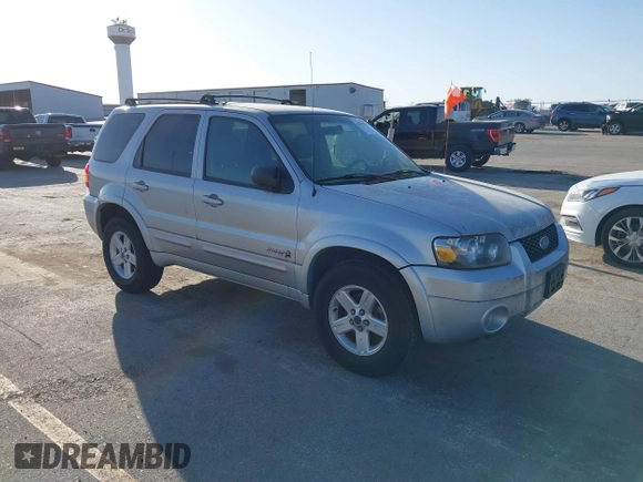 2006 Ford Escape Hybrid with VIN 1FMCU96H96KA25796, listed as a IAAI auction lot 41796914 with 119,809 mi miles and . Bid and sale history available at DreamBid. Image 1.