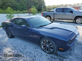 2013 Dodge Challenger SRT-8 z VIN 2C3CDYCJ9DH587681, wystawiony jako Copart lot #58035815 z przebiegiem 59 910 mil mil oraz Tytuł czysty. Historia ofert i sprzedaży dostępna na DreamBid. Obrazek 4.