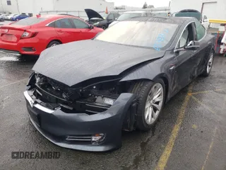 2018 Tesla Model S 75D with VIN 5YJSA1E24JF245215, listed as a Copart auction lot 63788121 with Not provided miles and Salvage title. Bid and sale history available at DreamBid. Image 2.