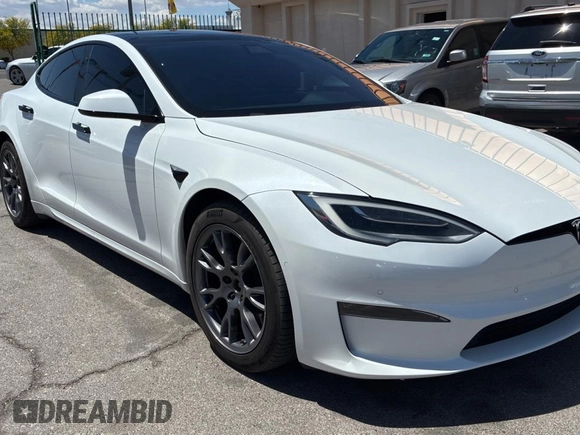 2021 Tesla Model S Plaid с VIN 5YJSA1E64MF447124, выставлен на аукционе Copart как лот 55833265 с пробегом 61 623 миль миль и Чистый • Clean title. История ставок и продаж доступна на DreamBid. Изображение 1.