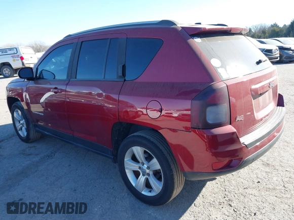 2016 Jeep Compass Latitude with VIN 1C4NJDEB1GD662807, listed as a IAAI auction lot 41161996 with 128,030 mi miles. Bid and sale history available at carsss.com. Image 3.