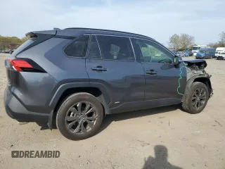 2023 Toyota RAV4 Hybrid XLE Premium z VIN JTMB6RFV4PD089184, wystawiony jako Copart lot #53453205 z przebiegiem 29 931 mil mil oraz Szkoda całkowita • Salvage title. Historia ofert i sprzedaży dostępna na DreamBid. Obrazek 3.