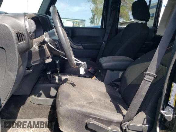 2018 Jeep Wrangler JK Unlimited Sport S with VIN 1C4BJWDG9JL812395, listed as a Copart auction lot 76397134 with 64,866 mi miles and Salvage Title. Bid and sale history available at carsss.com. Image 7.