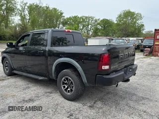 2016 Ram 1500 Rebel z VIN 1C6RR7YT2GS171455, wystawiony jako Copart lot #54708635 z przebiegiem 150 421 mil mil oraz Tytuł czysty. Historia ofert i sprzedaży dostępna na DreamBid. Obrazek 3.