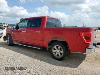 2021 Ford F-150 XL with VIN 1FTEW1C52MFA73276, listed as a Copart auction lot 61730665 with 163,262 mi miles and Salvage title. Bid and sale history available at DreamBid. Image 2.