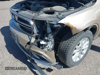 2014 Dodge Durango SXT with VIN 1C4RDJAG0EC455787, listed as a IAAI auction lot 42651627 with 103,218 mi miles and . Bid and sale history available at DreamBid. Image 6.