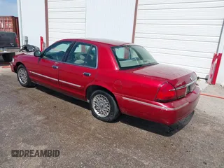 1999 Mercury Grand Marquis GS z VIN 2MEFM74W2XX635561, wystawiony jako IAAI lot #41982451 z przebiegiem 233 137 mil mil oraz . Historia ofert i sprzedaży dostępna na DreamBid. Obrazek 3.