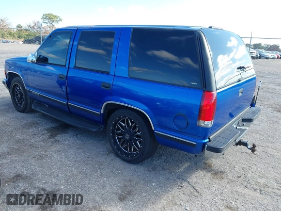 1997 GMC Yukon with VIN 1GKEC13R0VJ744958, listed as a IAAI auction lot 41474196 with 257,847 mi miles. Bid and sale history available at carsss.com. Image 3.