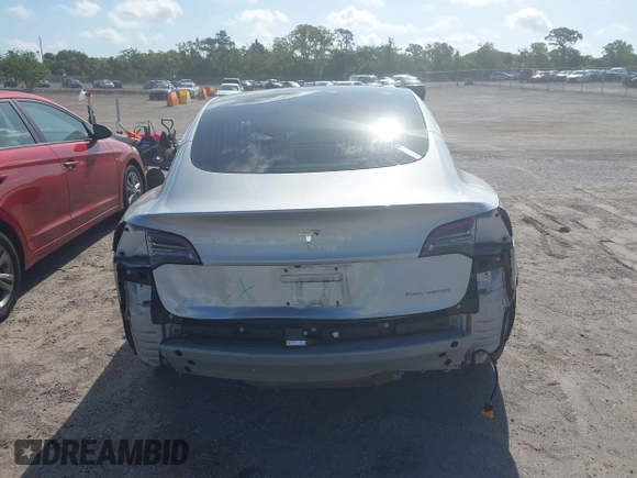 2018 Tesla Model 3 Long Range Battery with VIN 5YJ3E1EB7JF104356, listed as a IAAI auction lot 41936961 with 90,932 mi miles and . Bid and sale history available at DreamBid. Image 17.