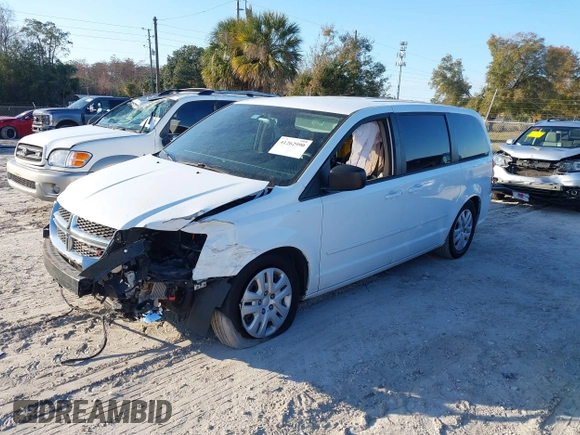 2014 Dodge Grand Caravan SE with VIN 2C4RDGBG1ER220534, listed as a IAAI auction lot 41262990 with 77,851 mi miles and . Bid and sale history available at DreamBid. Image 2.