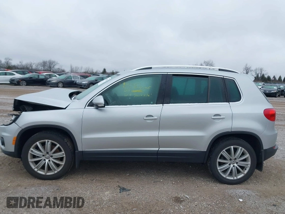 2016 Volkswagen Tiguan SEL z VIN WVGBV7AX3GW594729, wystawiony jako IAAI lot #41233805 z przebiegiem 92 997 mil mil oraz . Historia ofert i sprzedaży dostępna na DreamBid. Obrazek 14.