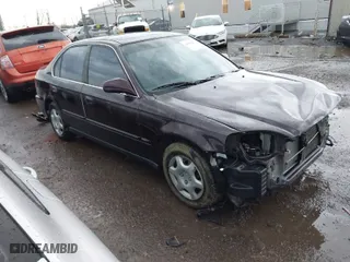 2000 Honda Civic EX with VIN 1HGEJ8644YL037589, listed as a IAAI auction lot 41891907 with 127,086 mi miles. Bid and sale history available at carsss.com. Image 1.