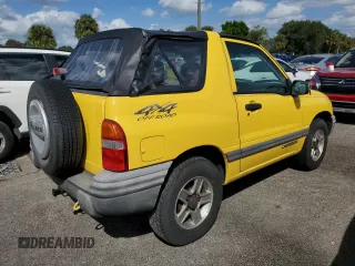 2002 Chevrolet Tracker z VIN 2CNBJ18C326943340, wystawiony jako Copart lot #74628774 z przebiegiem Nie podano mil oraz Szkoda całkowita • Salvage title. Historia ofert i sprzedaży dostępna na DreamBid. Obrazek 3.