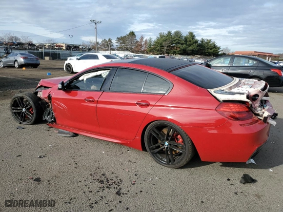 2015 BMW 6 Series 650i with VIN WBA6B2C57FGB99619, listed as a Copart auction lot 83660614 with 51,551 mi miles and Salvage Title. Bid and sale history available at carsss.com. Image 2.