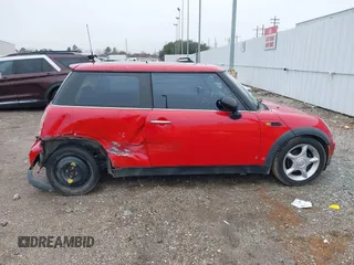 2003 MINI Hardtop with VIN WMWRC33413TC48601, listed as a IAAI auction lot 41418901 with 57,095 mi miles and . Bid and sale history available at DreamBid. Image 14.
