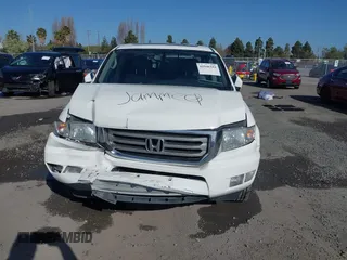 2013 Honda Ridgeline RTL with VIN 5FPYK1F50DB003971, listed as a IAAI auction lot 41946344 with 240,051 mi miles. Bid and sale history available at carsss.com. Image 6.
