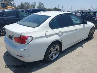 2014 BMW 3 Series 328i with VIN WBA3C1C59EK111396, listed as a IAAI auction lot 42471040 with 182,636 mi miles and . Bid and sale history available at DreamBid. Image 4.
