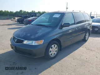 2003 Honda Odyssey EX with VIN 5FNRL18673B112958, listed as a IAAI auction lot 42172282 with 189,521 mi miles and . Bid and sale history available at DreamBid. Image 2.