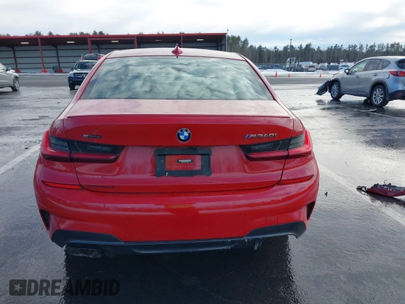 2022 BMW 3 Series M340i xDrive with VIN WBA5U9C01NFM09684, listed as a IAAI auction lot 41670169 with 38,640 mi miles and . Bid and sale history available at DreamBid. Image 16.
