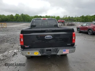 2023 Ford F-150 XL with VIN 1FTEX1EPXPKE88370, listed as a Copart auction lot 57719225 with 31,440 mi miles and Salvage title. Bid and sale history available at DreamBid. Image 6.