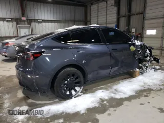 2023 Tesla Model Y Long Range z VIN 7SAYGAEE3PF968231, wystawiony jako Copart lot #45811385 z przebiegiem Nie podano mil oraz Szkoda całkowita • Salvage title. Historia ofert i sprzedaży dostępna na DreamBid. Obrazek 3.
