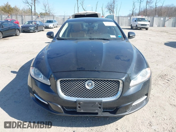 2013 Jaguar XJ Portfolio with VIN SAJWJ2GDXD8V55879, listed as a IAAI auction lot 41568366 with 121,119 mi miles and . Bid and sale history available at DreamBid. Image 12.