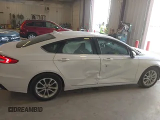 2020 Ford Fusion SE with VIN 3FA6P0HD4LR165511, listed as a IAAI auction lot 42136252 with 30,709 mi miles and . Bid and sale history available at DreamBid. Image 6.