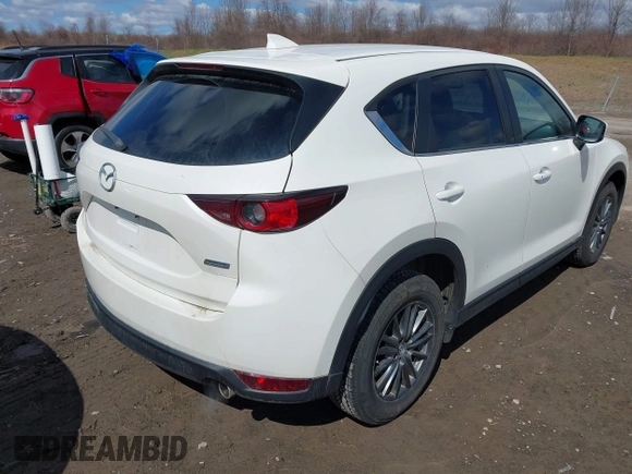 2019 Mazda CX-5 Touring with VIN JM3KFBCMXK0595905, listed as a IAAI auction lot 41934373 with 83,020 mi miles. Bid and sale history available at carsss.com. Image 4.