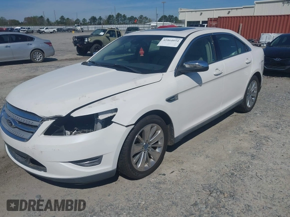 2011 Ford Taurus Limited with VIN 1FAHP2FW1BG121044, listed as a IAAI auction lot 41864054 with 217,929 mi miles and . Bid and sale history available at carsss.com. Image 2.