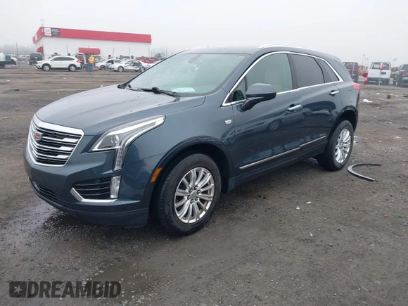 2019 Cadillac XT5 FWD with VIN 1GYKNARS5KZ220134, listed as a IAAI auction lot 41472927 with 58,229 mi miles and . Bid and sale history available at DreamBid. Image 17.