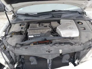 2007 Lexus RX 400h with VIN JTJGW31U572004833, listed as a IAAI auction lot 41938575 with 221,084 mi miles and . Bid and sale history available at DreamBid. Image 10.