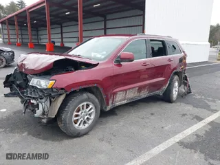 2019 Jeep Grand Cherokee Laredo E with VIN 1C4RJFAG2KC814154, listed as a IAAI auction lot 38877814 with 54,119 mi miles. Bid and sale history available at carsss.com. Image 2.