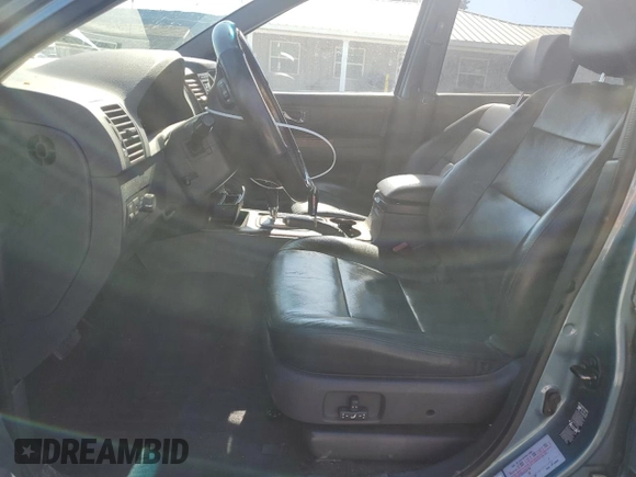 2003 Kia Sorento LX with VIN KNDJC733235055552, listed as a Copart auction lot 56196055 with 109,995 mi miles and Salvage title. Bid and sale history available at DreamBid. Image 7.