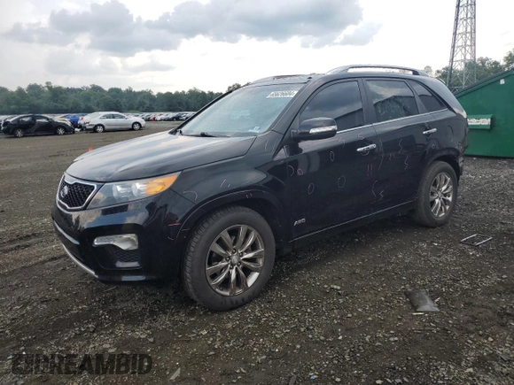 2012 Kia Sorento SX with VIN 5XYKWDA2XCG306782, listed as a Copart auction lot 65626604 with 137,060 mi miles and Salvage Title. Bid and sale history available at carsss.com. Image 1.
