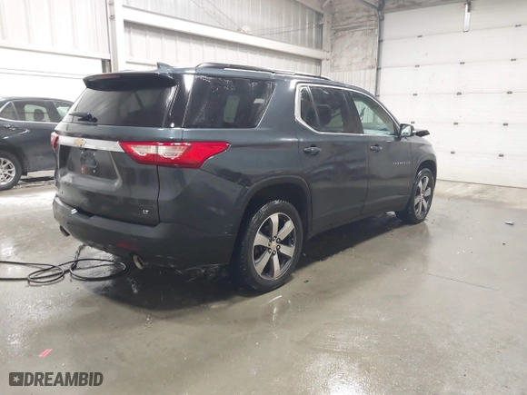 2019 Chevrolet Traverse LT Leather with VIN 1GNEVHKW7KJ235958, listed as a IAAI auction lot 41895988 with 79,097 mi miles. Bid and sale history available at carsss.com. Image 4.