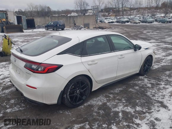 2023 Honda Civic Sport z VIN 19XFL2H89PE008381, wystawiony jako IAAI lot #41443683 z przebiegiem Nie podano mil oraz . Historia ofert i sprzedaży dostępna na DreamBid. Obrazek 4.