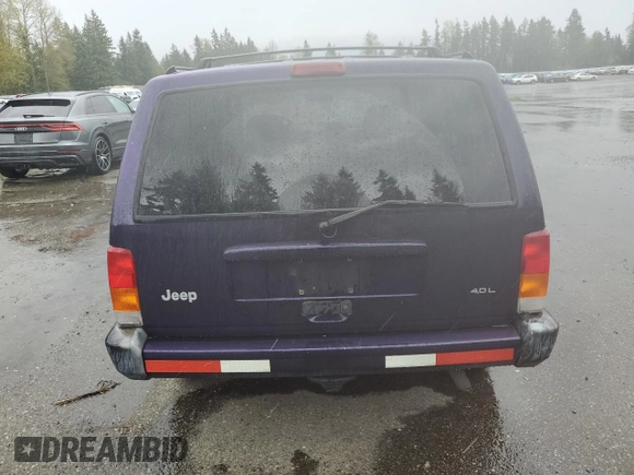1999 Jeep Cherokee Sport with VIN 1J4FF68S6XL602177, listed as a Copart auction lot 51962355 with 176,386 mi miles and Salvage Title. Bid and sale history available at carsss.com. Image 6.