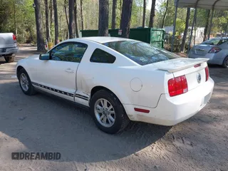 2008 Ford Mustang Deluxe with VIN 1ZVHT80N585151206, listed as a IAAI auction lot 42001372 with 199,207 mi miles and . Bid and sale history available at carsss.com. Image 3.