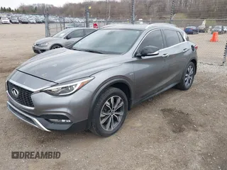 2017 Infiniti QX30 Premium z VIN SJKCH5CR2HA022260, wystawiony jako IAAI lot #42067553 z przebiegiem 85 301 mil mil oraz . Historia ofert i sprzedaży dostępna na DreamBid. Obrazek 17.