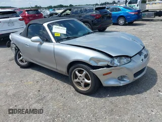 2002 Mazda MX-5 Miata Cloth z VIN JM1NB353920231986, wystawiony jako IAAI lot #42001420 z przebiegiem 113 298 mil mil oraz . Historia ofert i sprzedaży dostępna na DreamBid. Obrazek 1.
