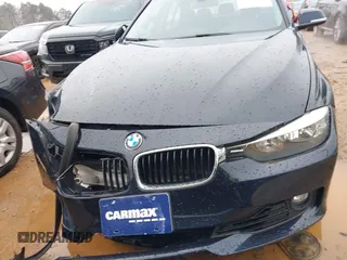 2013 BMW 3 Series 328i xDrive with VIN WBA3B3C54DF536675, listed as a IAAI auction lot 41185325 with 90,296 mi miles and . Bid and sale history available at carsss.com. Image 12.