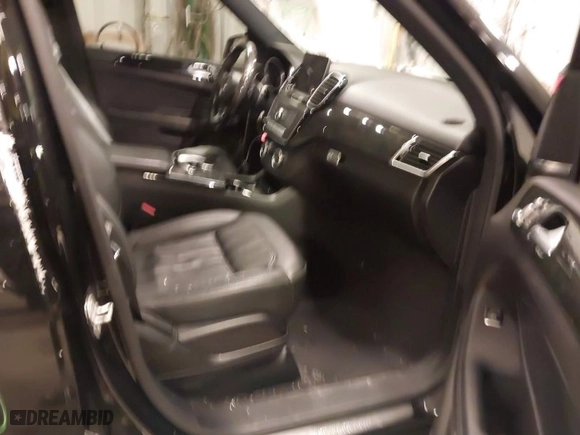 2016 Mercedes-Benz GLE with VIN 4JGDA5HB5GA797279, listed as a IAAI auction lot 41374979 with 92,672 mi miles. Bid and sale history available at carsss.com. Image 5.