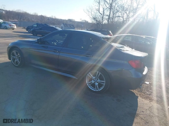 2014 BMW 3 Series 335i xDrive with VIN WBA3B9G54ENR91076, listed as a IAAI auction lot 41643651 with 55,558 mi miles. Bid and sale history available at carsss.com. Image 3.