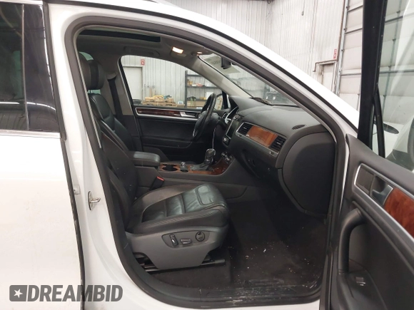 2013 Volkswagen Touareg Lux with VIN WVGEF9BP5DD011511, listed as a IAAI auction lot 41608840 with 167,350 mi miles and . Bid and sale history available at DreamBid. Image 5.