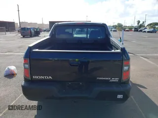 2013 Honda Ridgeline Sport with VIN 5FPYK1F70DB011814, listed as a IAAI auction lot 41689579 with 136,251 mi miles and . Bid and sale history available at DreamBid. Image 16.