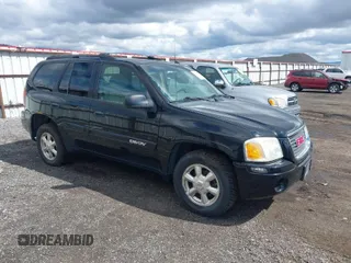 2005 GMC Envoy SLE with VIN 1GKDT13S552212811, listed as a IAAI auction lot 41996953 with 147,896 mi miles. Bid and sale history available at carsss.com. Image 1.