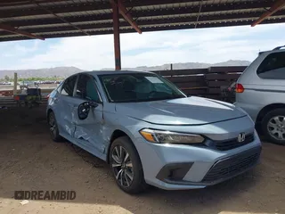2024 Honda Civic EX with VIN 2HGFE1F79RH335869, listed as a IAAI auction lot 42357648 with 7,871 mi miles and . Bid and sale history available at DreamBid. Image 1.